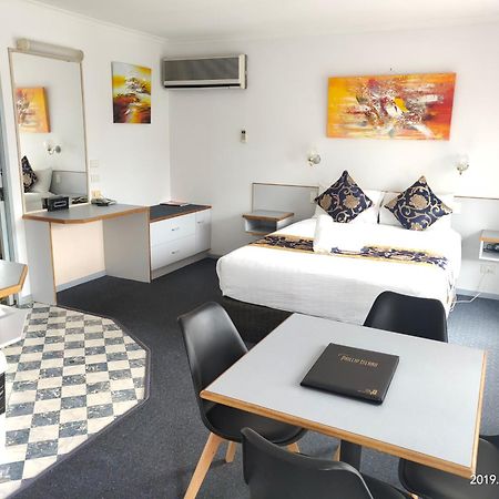 קאווס Coachman Motel And Holiday Units חדר תמונה